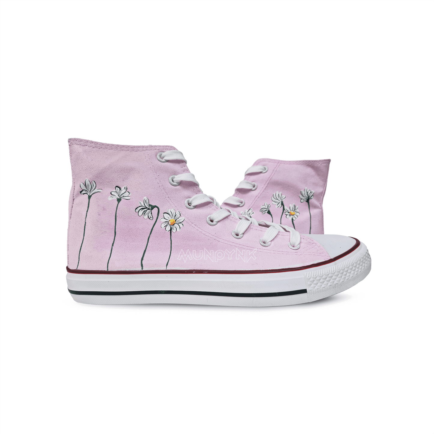 zapatillas de tela blanca con diseño de margaritas blanca con fondo rosa claro y cordones en blanco